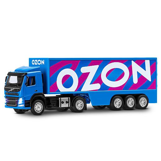 Игрушка для детей: Машинка металлическая 1:50 Volvo OZON, цвет синий, откидывается кабина, свет, звук, свободный ход колес, артикул JB1251739 в Джамбо Тойз #3