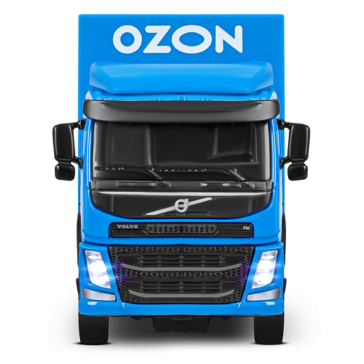 Игрушка для детей: Машинка металлическая 1:50 Volvo OZON, цвет синий, откидывается кабина, свет, звук, свободный ход колес, артикул JB1251739 в Джамбо Тойз #11