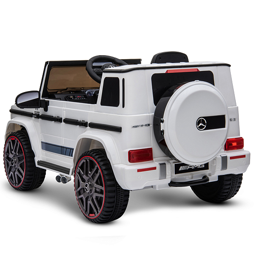 Электромобиль Mercedes Benz AMG на аккум.,12V/4.5AH*1, 380*2, Р/У 2.4GHz, свет, звук, сиденье эко-кожа, колеса EVA,откр.двери,индик.зарядки, MP3, плавн.старт, в/к 105*55*33см. Цвет - белый. в Джамбо Тойз #6