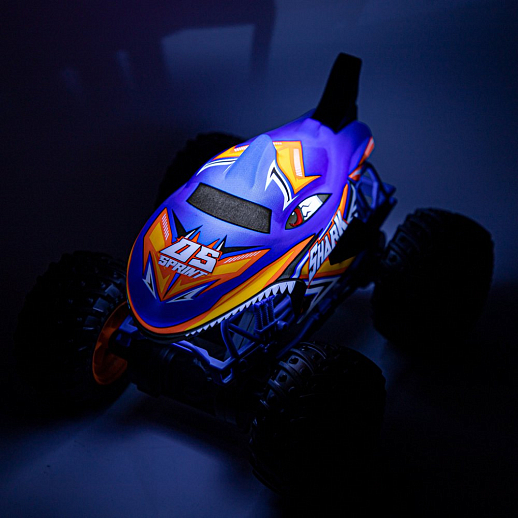 Р/у Монстр-трак Акула, перевертыш, 1:16, 4WD, 3D подсветка корпуса, гироскоп: может ездить на двух колесах, звук.эффекты, цвет голубой с оранжевым, с аккум., в/к 24*20*26 см в Джамбо Тойз #14