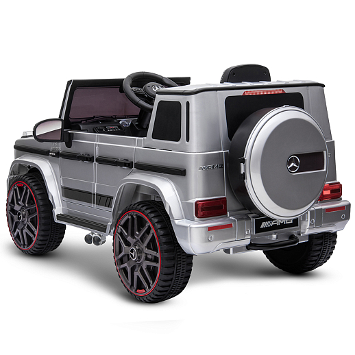 Электромобиль Mercedes Benz AMG на аккум.,12V/4.5AH*1, 380*2, Р/У 2.4GHz, свет, звук, сиденье эко-кожа, колеса EVA,откр.двери,индик.зарядки, MP3, плавн.старт, в/к 105*55*33см. Цвет - серебро. в Джамбо Тойз #6