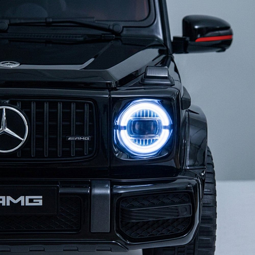 Электромобиль Mercedes Benz AMG на аккум.,12V/4.5AH*1, 380*2, Р/У 2.4GHz, свет, звук, сиденье эко-кожа, колеса EVA,откр.двери,индик.зарядки, MP3, плавн.старт, в/к 105*55*33см. Цвет - черный. в Джамбо Тойз #7