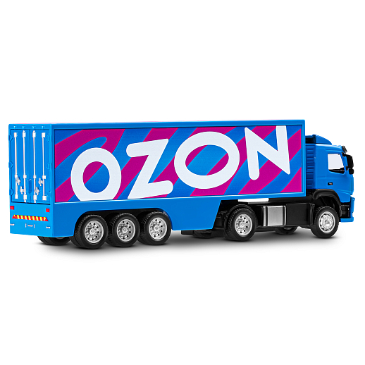 Игрушка для детей: Машинка металлическая 1:50 Volvo OZON, цвет синий, откидывается кабина, свет, звук, свободный ход колес, артикул JB1251739 в Джамбо Тойз #9