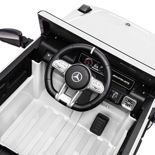 Электромобиль Mercedes Benz AMG на аккум.,12V/4.5AH*1, 380*2, Р/У 2.4GHz, свет, звук, сиденье эко-кожа, колеса EVA,откр.двери,индик.зарядки, MP3, плавн.старт, в/к 105*55*33см. Цвет - белый. в Джамбо Тойз #4
