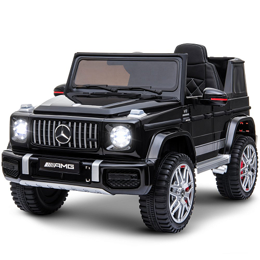 Электромобиль Mercedes Benz AMG на аккум.,12V/4.5AH*1, 380*2, Р/У 2.4GHz, свет, звук, сиденье эко-кожа, колеса EVA,откр.двери,индик.зарядки, MP3, плавн.старт, в/к 105*55*33см. Цвет - черный. в Джамбо Тойз