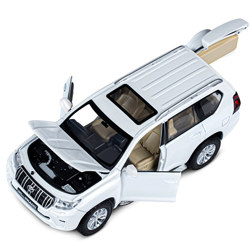 ТМ "Автопанорама" Машинка металлическая, 1:24,  Land Cruiser Prado, белый, открываются двери, капот и багажник, свободный ход колес, световые и звуковые эффекты, в/к 24,5х12,5х10,5 см в Джамбо Тойз #13