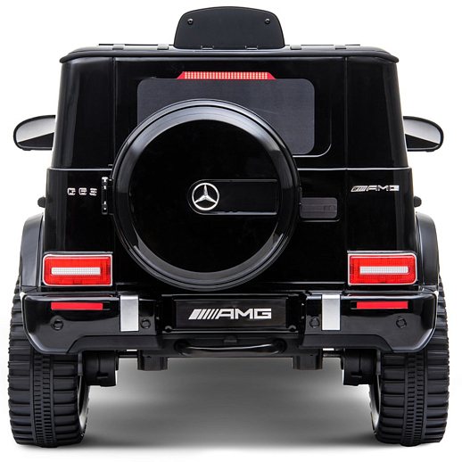 Электромобиль Mercedes Benz AMG на аккум.,12V/4.5AH*1, 380*2, Р/У 2.4GHz, свет, звук, сиденье эко-кожа, колеса EVA,откр.двери,индик.зарядки, MP3, плавн.старт, в/к 105*55*33см. Цвет - черный. в Джамбо Тойз #8