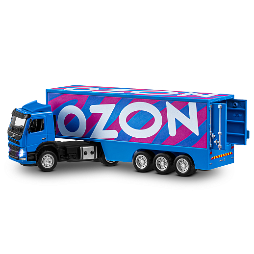 Игрушка для детей: Машинка металлическая 1:50 Volvo OZON, цвет синий, откидывается кабина, свет, звук, свободный ход колес, артикул JB1251739 в Джамбо Тойз #20