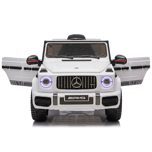 Электромобиль Mercedes Benz AMG на аккум.,12V/4.5AH*1, 380*2, Р/У 2.4GHz, свет, звук, сиденье эко-кожа, колеса EVA,откр.двери,индик.зарядки, MP3, плавн.старт, в/к 105*55*33см. Цвет - белый. в Джамбо Тойз #9
