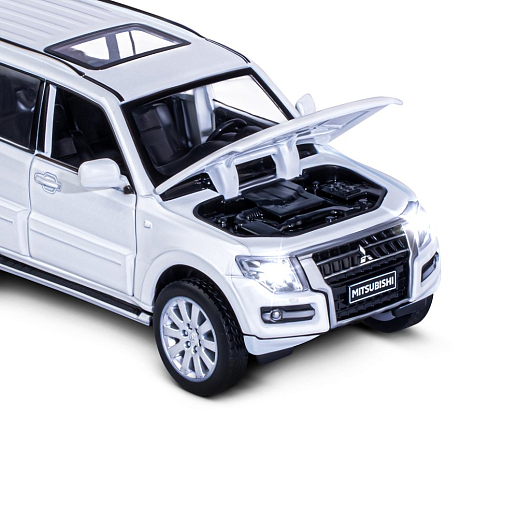 ТМ "Автопанорама" Машинка металлическая 1:33 Mitsubishi Pajero 4WD Turbo, белый, откр. двери, капот и багажник, свет, звук, инерция, в/к 17,5*13,5*9 см в Джамбо Тойз #17