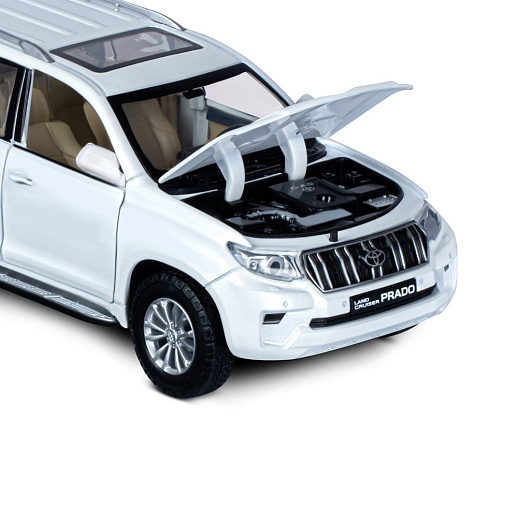 ТМ "Автопанорама" Машинка металлическая, 1:24,  Land Cruiser Prado, белый, открываются двери, капот и багажник, свободный ход колес, световые и звуковые эффекты, в/к 24,5х12,5х10,5 см в Джамбо Тойз #17